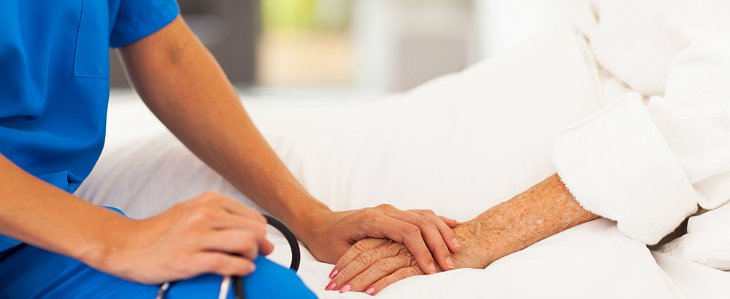 Home Health Aide Caring For Patients