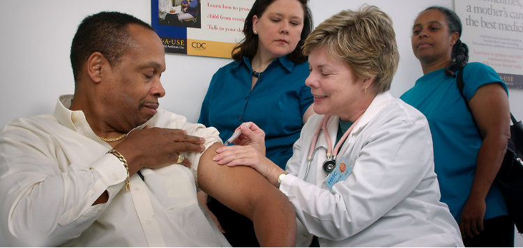 Nurse Vaccinates Patient